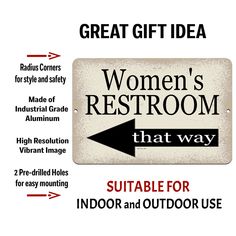 a sign that says, women's restroom that way suitable for indoor and outdoor use