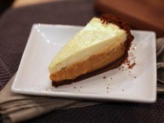 a slice of cheesecake on a white plate