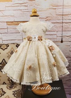 "★Ivory Christening Gown, Baptism Dress★ ★Occasion: Baptism, Child Blessing or any Special Occasion ★Comes With: Dress and Headband ★Measurements 9-12 months, (Long 19\") (Waist 17\") (Shoulder to Shoulder 7.5\") 12-18 months, (Long 20\") (Waist 19\") (Shoulder to Shoulder 8\") 18-24 months, (Long 22\") (Waist 21\") (Shoulder to Shoulder 9\") -Waist measurement is around ★Features: (The waist is adjustable, has two ribbons to make a bow, as in the photo) Please check the measurements, and any questions send me a message,  your satisfaction is very important for me Comes with a Dress Bag Dry Clean Only" Elegant Cream Baptism Dress For Ceremony, Cream Baptism Dress For Ceremony, Cream Fitted Princess Dress For Baptism, Elegant Beige Baptism Dress For Wedding, Fitted Cream Dress For Confirmation, Fitted Gold Princess Dress For Baptism, Cream Fitted Princess Dress For Wedding, Cream Lace Baptism Dress For Pageant, Fitted Beige Baptism Dress