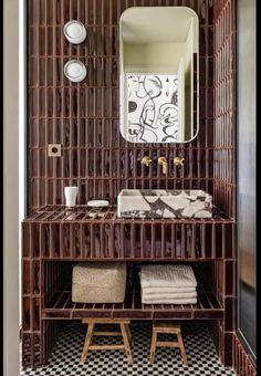 the bathroom is decorated in brown and white