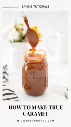 a jar filled with caramel sauce sitting on top of a table