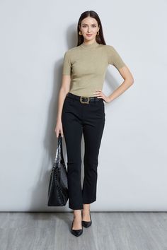 We chose our favorite ponte knit for this sporty chic pant. Modern lines and the inseam hem slit make it a perfect update to your pant wardrobe. Elie Tahari Exclusive Ponte Knit Pant with Pintuck Lines and Inseam Slits 59% Nylon, 35% Viscose, 6% Elastane Runs true to size. Model is 5'9" and wearing size S Measurements: 10"L Front Rise; 29.5"L Inseam (approx. length for a size 6) Dry Clean Only Imported Style #: E146D213 Chic Pants, Ponte Pants, Jumpsuit Jacket, Elie Tahari, Long Sleeve Short Dress, Sporty Chic, Knit Tees, Denim Coat, Knit Pants