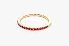 "14k Solid Gold Ruby Ring / Half Eternity Ruby Ring Micro Pave Set / Stackable Natural Genuine Ruby Ring / July Birthstone Ring Ferko's Fine Jewelry Features * Made to Order * Gold Kt: 14K (also available in 18K) * Available Gold Color: Rose Gold, Yellow Gold, White Gold * Width of Ring - 1.65MM * Round Ruby: 19 pc 1.45MM * Ruby CTW: 0.30 ctw * Ready to Ship in 7-10 Business Days If you have any additional questions about this product, just hit the \"Message Ferko\" button and we will get back t Gold Ruby Ring, July Birthstone Ring, Ruby Ring Gold, Diamond Solitaire Necklace, Solitaire Necklaces, Eternity Ring Diamond, July Birthstone, Art Deco Diamond, Platinum Ring