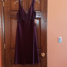 Jones Of New York Size 12 Purple Dress. V Neck Line. Has Decorative Oranaments At Chestline. Nwt 90s Grunge Slip Dress, Dark Purple Vintage Dress, Lorelei Gilmore Dress, Holiday Formal Purple Dress, Dark Purple Dress Short, Dark Purple Short Dress, Dark Purple Formal Dress, 2000s Dresses, Purple Dress Short