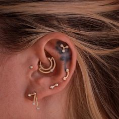 a woman with ear piercings on her ears