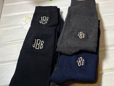 NKDs offering: MEN'S CASUAL/DRESS COTTON /FLAT & RIBBED CREW Monogrammed SOCKS  Are these the must-haves? Here I have "a pair" of very classy men's monogrammed COTTON CREW socks.   They have a very wonderful embroidered monogram in the color and font of your choice.  →For teen boys and men →Monogram can be on ONE (R) or BOTH socks.  ------------------------------- This monogram is at the top.  If you would like it placed lower by the ankle, there will be a charge of $1.50 ADDED PER SOCK $3 per p Wedding Socks Nfl, Groomsmen Socks Picture, Mens Embroidery Socks, Groomsman Sock, Socks Monogram, Embroidered Socks, Embroidered Initials, Mens Dress Socks, Wedding Initials