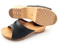 Health clogs, women's clogs with open fingers. The upper is made of natural grain leather. Wooden sole, padded with non-slip soles. A model that fits a typical foot width. Classic, standard numbering. The thickness of the soles under the fingers is 2 cm Height of the bottom under the heel 4.5 cm Women's clogs slippers Polish production. The top is made entirely of natural leather. The edge of the upper is lined with a soft trim, which gives them comfort and convenience (it does not put pressure Wood Clogs, Womens Clogs And Mules, Eco Materials, Swedish Clogs, Clogs And Mules, Violin Music, Wooden Clogs, Clog Slippers, Women's Clogs