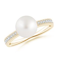 This elegant solitaire ring in 14k yellow gold displays a South Sea cultured pearl, set on a reverse tapered shank. The shank is encrusted with graduating pavé-set round diamonds that dazzle endlessly. Cultured Pearl Ring, Golden South Sea Pearls, Double Diamond, Sea Pearl, Pearl Set, Akoya Pearls, South Sea Pearls, Pearl Ring, Cultured Pearls