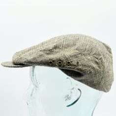 "-Vintage  ascot beige, green, and black cross stitched classic newsboy hat with brim snap buttons and side rivet holes for ventilation -Quaker Marine Supply and Made in USA makers marks -Hat is made of 100% silk herrringbone tweed -Soft, smooth, and comfortable material -Great vintage condition -Classic and elegant statement piece! Width: 10\" / 25.4 cm Height: 7\" / 17.8 cm Depth: 10 1/2\" / 26.7 cm Circumference: 21\" / 53.3 cm" Newsboy Hat, Black Cross, News Boy Hat, Newsboy Cap, Green And Black, Rivets, Makers Mark, Modern Woman, Herringbone