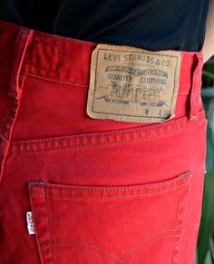 "Cool vintage red denim 451 pants by Levi's. High waisted, \"mom\" cut with straight legs. Silver rivets and buttons with signatures. Look good with cuffed legs. Buttoned up fly. White tab. Era: 90's, brand Levi Strauss Fabric: 100% cotton Condition: very good, a bit washed off Estimated size: S, will fit best a tall person (please, check the measurements) Measurements (measured flat - need to be doubled to get the circumference): Waist: 34 cm / 13,4 inches Hips: 48 cm / 18,9 inches Length: 107 Luxury Red Straight Leg Jeans, Cheap Red Jeans For Spring, Cheap Mid-rise Red Jeans, Cheap Red Women's Jeans, Affordable Red Mid-rise Jeans, Cheap Red Spring Jeans, Cheap Red Workwear Bottoms, Cheap Red Denim Pants, Cheap Red Mid-rise Pants