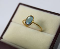 14k Solid Gold Natural London Blue Topaz Slice Ring / Free from slice gold Ring / Handmade Gemstone Ring  Stone Size  - 6X8 MM Band Thickness - 1.2mm  Gold Colour Options -  Yellow Gold, White Gold, Rose Gold  Ready to Ship 1-2 week  Available Yellow, Rose Gold ( also in 9K, 10K, 14K, 18K, 22K ) Customization is available, I also can make it with 9k,10k,14k,18k,22k solid gold (white or rose), and diamond accent stone, just feel free to contact me.  *    PACKAGING: The Ring will be delivered in i Faceted Topaz Ring In 14k Gold As Gift, Faceted Oval Topaz Ring Gift, Topas Gold, Slice Ring, Yellow Topaz Ring, Solid Gold Ring, Ring Stone, Solid Gold Rings, Gold Colour