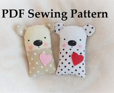 two stuffed animals with hearts on them sitting next to the text pdf sewing pattern