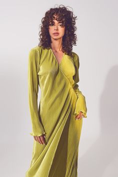 Introducing our stunning Satin Wrap Detail Pleated Dress in Green, perfect for any special occasion. This dress features a midi length, V-neck neckline, and long sleeves for a touch of elegance. The wrap front and tie waist detail create a flattering silhouette, while the thigh split adds a touch of glamour. Made of high-quality satin fabric with a hint of stretch, this dress is both comfortable and chic. The tie fastening ensures a secure and customized fit. Whether you're attending a wedding o Satin Wrap Dress, Statement Dress, Wrap Midi Dress, Pleated Midi Dress, Green Midi Dress, Green Satin, Long Sleeve Midi, Midi Length Dress, Polished Look