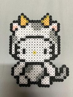 the hello kitty perler is made out of plastic beads