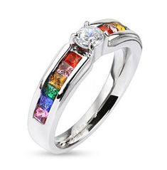 a white gold ring with rainbow colored stones