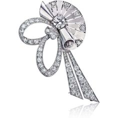 Presenting the exquisite Raymond C. Yard 1940's Platinum Retro Diamond Fan Clip Brooch, a true gem that embodies elegance and sophistication. This brooch is a delightful accessory that radiates charm and personality. Adorned with an enchanting array of diamonds, it captivates the eye and adds a touch of sparkle to any ensemble.Crafted with meticulous attention to detail, this brooch features a full-cut diamond at its center, weighing approximately 0.65 carat, surrounded by a stunning collection Extraordinary Jewelry, Ribbon Flower, Antique Brooches, Platinum Metal, Fine Jewels, Ribbon Flowers, Lovely Jewellery, Round Cut Diamond, Estate Jewelry