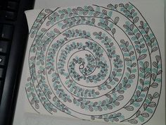 an image of a spiral design on paper