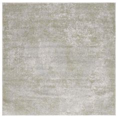 an area rug with light green and white colors