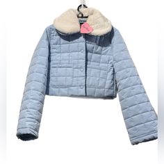 ~Nwt, Size Xxs, Dry Clean Only ~Quilted Construction W/Faux Fur Peter Pan Collar ~Front Square Pockets, Long Sleeve ~Button-Up Closure ~100% Polyester ~Smoke Free/Dog Friendly Home ~Poos Fcfs ~Pickup Or Meet Locally, Shipping & Bundling Available ~$45 (Reg $78) Or Best Offer (C), No Lowballing Fitted Puffer Jacket With Padded Collar, Fitted Long Sleeve Puffer Jacket With Padded Collar, Blue Outerwear With Faux Fur Trim And Long Sleeves, Blue Outerwear With Faux Fur Trim For Winter, Blue Winter Outerwear With Faux Fur Trim, Blue Long Sleeve Outerwear With Faux Fur Trim, Fitted Cropped Jacket With Faux Fur Trim Long Sleeve, Fitted Long Sleeve Cropped Jacket With Faux Fur Trim, Chic Light Blue Winter Outerwear