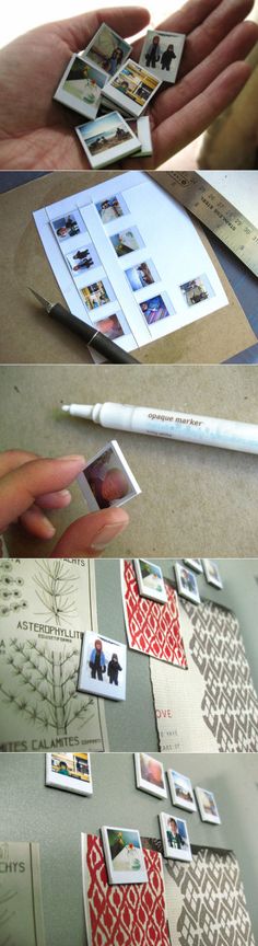 several photographs are being displayed on the table and in front of them is a hand holding a pen