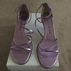 Authentic Yves Saint Laurent Strappy Lavender 2- 3/4" Heel Sandal. Never Worn Small Scuff On The Left Shoe (Purchased That Way)! Size 7 Lavender Open Toe Evening Heels, Lavender Open Toe Heels For Evening, Elegant Lavender Heels For Formal Occasions, Lavender Round Toe Heels For Evening, Fitted Purple Sandals For Evening, Lavender Open Toe Heels For Formal Occasions, Elegant Lavender Ankle Strap Heels, Ysl Sandals, Yves Saint Laurent Shoes