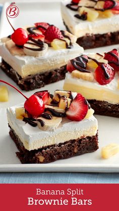 four desserts are arranged on a white platter with cherries and banana slices