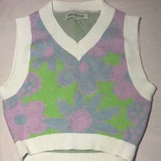 Cropped Sweater. Soft Material. Never Worn. Xs But Could Fit A Small. For Reference I Am Medium And It Fits Snug. This Was My Sister’s, So I Will Not Let It Go For Anything Less Than The Listing Price. Y2k Floral Print Top For Spring, Cute V-neck Crop Top For Spring, Spring V-neck Cute Crop Top, Multicolor Y2k Crop Top For Spring, Pink Floral Print Y2k Tops, Cute Pastel Tops For Spring, Spring Green Crop Top By Urban Outfitters, Urban Outfitters Green Crop Top For Spring, Retro White Crop Top For Spring