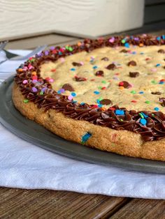 a chocolate chip cookie pie with sprinkles on it