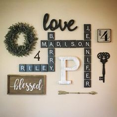 the word love spelled with scrabbles, letters, and other decorative items