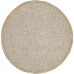 a round rug with an oval design on the bottom in beige and tan linens