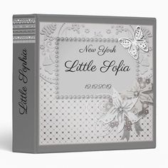 the new york little hola album is shown in grey and white with silver trim