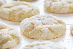 freshly baked cookies are lined up on a baking sheet