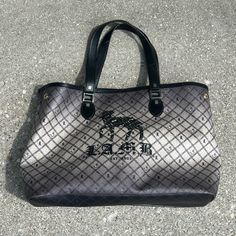 Large Oversized Tote Bag With L.A.M.B. Logo On Front. From Gwen Stefani’s Label. Striped Interior. Very Good Pre-Owned Condition. Some Wear On Straps And Some Discoloration On Back Where Strap Handles Are. Should Be Able To Be Cleaned. Luxury Gray Shoulder Bag With Leather Handles, Luxury Gray Shoulder Bag With Dust Bag, Luxury Gray Shoulder Bag With Double Handle, Chic Gray Shoulder Bag With Dust Bag, Designer Gray Tote Bag, Designer Gray Bags For Daily Use, Luxury Gray Bags With Leather Handles, Designer Gray Satchel Bag, Designer Gray Bags