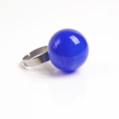 This joyful statement Blue ball ring can be a shining addition to your outfit or simply a unique note, matching your mood and individuality! Dimensions: the ring is adjustable. The bead is 20-22mm (about 0.8-0.9 inch) in diameter. Materials: artist lampwork bead, hypoallergenic stainless steel ring band. Colors used: blue. Please, note, each bead is made by hand and may differ slightly. All the photos that are represented in the item description, are images of different items, made at different Trendy Blue Ring For Parties, Trendy Blue Party Ring, Nickel Free Adjustable Rings For Parties, Adjustable Nickel-free Rings For Party, Modern Adjustable Rings For Party, Modern Adjustable Party Rings, Clear Bracelet, Bubble Ring, Glass Bubble