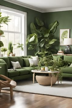 a living room with green couches and potted plants on the windowsills