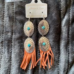 Orange Fringe Concho Earrings. Very Very Lightweight Bohemian Orange Jewelry For Spring, Orange Festival Earrings For Pierced Ears, Bohemian Orange Earrings For Spring, Spring Orange Drop Earrings, Nickel-free Orange Earrings For Festival, Orange Dangle Jewelry For Spring, Summer Orange Nickel-free Earrings, Arrowhead Earrings, Concho Earrings