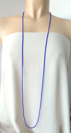 "This is a one strand beaded sapphire blue necklace, with NO CLASP, and can be worn in multiple ways, as shown in pictures. ❤ SIZES This item is one size fits all. ❤ PROCESSING AND SHIPPING Most orders are made and shipped out in one business day. Please check delivery timeframes for your location on the description below. ❤ CUSTOM ORDERS If you like this item in a different color, send me a message indicating: color, size and quantity needed. I will send you a link for a \"custom order\" and yo Hot Pink Earrings, Necklace Sapphire, Layered Beaded Necklaces, Black Beaded Bracelets, Necklace Layered, Red Necklace, Tassel Jewelry, Bridesmaid Bracelet, Jewelry Essentials