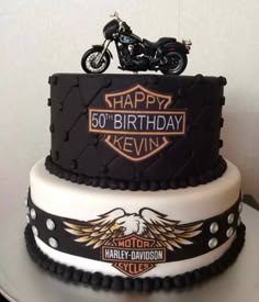 a birthday cake with a motorcycle on top