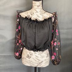 Shein Long Sleeve Off Shoulder Crop Top. Sleeves Are Sheer No Tags Was Ordered Online Chic Black Tops With Floral Embroidery, Spring Black Blouse For Night Out, Black Blouse For Spring Night Out, Black Blouse For Night Out In Spring, Black Crop Top Blouse For Spring, Black Tops With Floral Embroidery For Night Out, Black Top With Floral Embroidery For Night Out, Black Trendy Spring Blouse, Trendy Black Spring Blouse