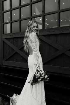 black and white photograph of woman in wedding dress