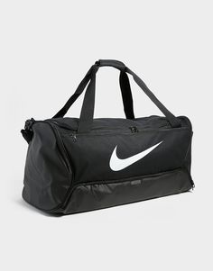 From Big Gym Sessions To Weekends Away, Keep Your Gear Secure With This Brasilia Large Duffle Bag From Nike. In A Black Colourway, This Spacious Bag Is Made From Durable Poly Fabric, With A Coated Bottom That Shields And Protects Your Essentials. It Features Two Handle Straps And A Detachable Shoulder Strap For Versatile Carry, While Multiple Zippered Compartments Offer Room To Store Your Dry And Wet Clothes Separately. With Outer Pockets For Your Easy-Access Items, This Bag Is Finished Up With Black Sports Bag, Rowing Outfit, Basketball Essentials, Volleyball Kit, Nike Duffel Bag, Gym Bag Men, Mens Duffel Bag, Nike Sports Bag, Gym Bag For Men