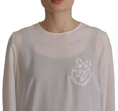 DOLCE & GABBANA  Gorgeous brand new with tags, 100% Authentic Dolce & Gabbana top with logo embroidery blouse. Crafted from silk.  Model: Round Neck long sleeve  Color: White  Logo details  Made in Italy  Material: 100% Silk Silk Long Sleeve Blouse, Elegant Logo, Dolce E Gabbana, Embroidery Blouse, White Silk, Embroidered Silk, Logo Embroidery, Dolce & Gabbana, Sleeve Designs