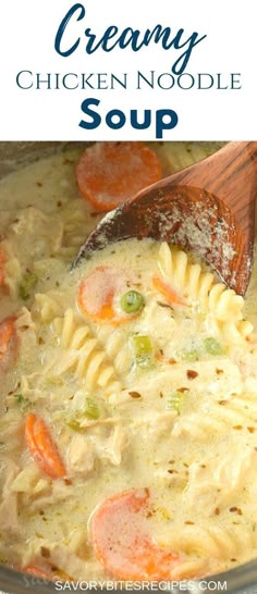 creamy chicken noodle soup in a pot with a wooden spoon and text overlay that reads creamy chicken noodle soup