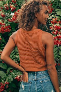 Lulus Exclusive! You'll look laid-back and carefree in the Lulus Get the Look Rust Orange Loose Knit Sweater Tank Top! This sweater tank is lightweight and breathable thanks to a breezy, loose-knit construction, sleeveless cut, and cropped fit. Rounded neckline tops the boxy, wide-cut bodice finished with side slits at the hem. Contrasting rib knit along the neck, sleeves, and hem. Fit: This garment fits true to size. Length: Size small measures 17" from shoulder to hem. Bust: Great for any cup Velma Cosplay, Fashionable Tops, Loose Knit Sweater, Loose Knit Sweaters, Loose Knit, Top Sweater, Rust Orange, Sweater Tank Top, Sweater Tank