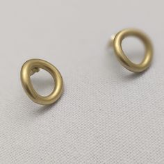 Olly earrings - these simple but stylish stud earrings are crafted from brass and coated with a matte gold plating for a timeless look. Perfect for any occasion, these earrings are a must-have for any luxury jewelry collection. Simple stud earrings, crafted from brass with a matte gold plating. Weight: 7.9 gm Dimensions: 1.9 cm x 1.9 cm Luxury Jewelry Collection, Simple Stud Earrings, Matte Gold, Luxury Jewelry, Gold Plating, Jewelry Collection, Gold Plate, Plating, Stud Earrings