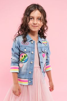 Our Rib Denim Jacket is everything you love about a classic denim jacket with a Supermix twist. We believe rainbow goes with everything so choose from a supersoft striped rib in Multicolor or Super Blue and make it yours. Ready. Set. Patch. ​ Customize the front, back, and sleeves​ Relaxed fit, with room to grow ​ Gender-neutral sizing ​ Loop back denim for extra softness ​ Colorful striped rib cuffs and hem Materials and Care ​ 69% Cotton, 30% polyester, 1% Spandex ​ We use BCI cotton. ​ Our pr Cheap Playful Denim Jacket, Kids Jeans Jacket Custom, Multicolor Graphic Print Denim Jacket, Unicorns And Rainbows, Jean Jacket For Girls, Kids Denim Jacket, Girls Denim Jacket, Glitter Unicorn, Classic Denim Jacket