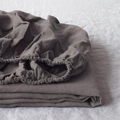 two blankets are folded on top of each other