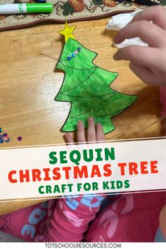 a child is making a christmas tree craft for kids