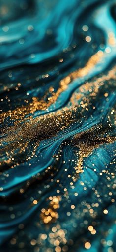 blue and gold glitter fabric with wavy lines