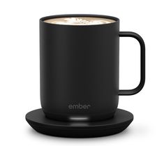 a black coffee cup on a saucer with the word ember printed on it